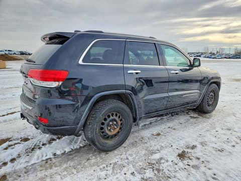 2014 Jeep Grand Cherokee, VIN 1C4RJFCM4EC318893. Фото 3 з 6 з аукціону Copart. Каталог авто зі США OpenDataCar.