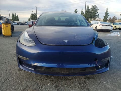2023 Tesla Model 3, VIN 5YJ3E1EB8PF594556. Фото 5 з 6 з аукціону Copart. Каталог авто зі США OpenDataCar.