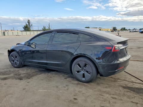 2023 Tesla Model 3, VIN 5YJ3E1EA3PF396197. Фото 2 из 6 с аукциона Copart. Каталог авто из США OpenDataCar.