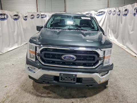 2021 Ford F-150 Lightning, VIN 1FTFW1E81MKD29264. Фото 5 з 6 з аукціону Copart. Каталог авто зі США OpenDataCar.