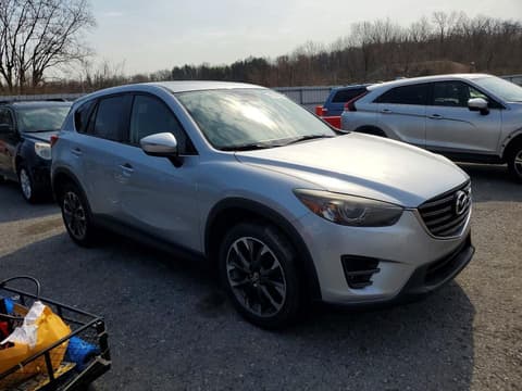 2016 Mazda CX-5, VIN JM3KE4DY0G0732275. Фото 4 з 6 з аукціону Copart. Каталог авто зі США OpenDataCar.