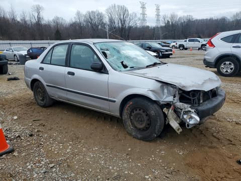 1999 Mazda Protege, VIN JM1BJ2224X0158528. Фото 4 з 6 з аукціону Copart. Каталог авто зі США OpenDataCar.