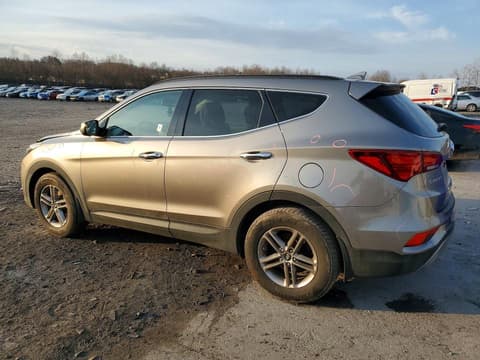 2017 Hyundai Santa Fe, VIN 5NMZUDLB9HH003006. Фото 2 из 6 с аукциона Copart. Каталог авто из США OpenDataCar.