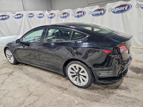 2023 Tesla Model 3, VIN 5YJ3E1EA0PF450247. Фото 2 з 6 з аукціону Copart. Каталог авто зі США OpenDataCar.