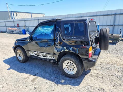 1996 Suzuki Sidekick, VIN 2S3TA02C1T6405962. Фото 2 из 6 с аукциона Copart. Каталог авто из США OpenDataCar.