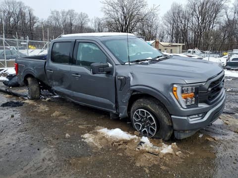 2023 Ford F-150 Lightning, VIN 1FTFW1E59PFB74062. Фото 4 з 6 з аукціону Copart. Каталог авто зі США OpenDataCar.
