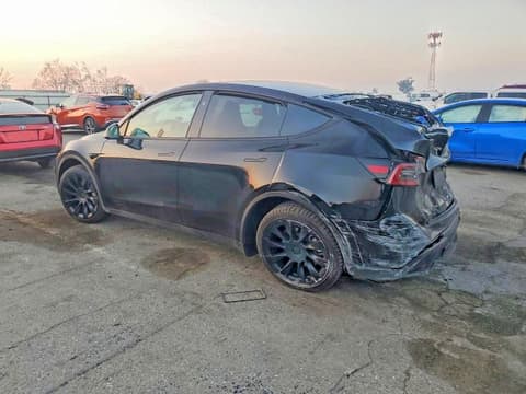 2024 Tesla Model Y, VIN 7SAYGDED0RF095193. Фото 2 з 6 з аукціону Copart. Каталог авто зі США OpenDataCar.