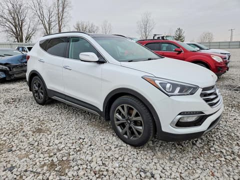 2018 Hyundai Santa Fe, VIN 5NMZWDLAXJH097923. Photo 4 of 6 from Copart auction. OpenDataCar US salvage catalog.