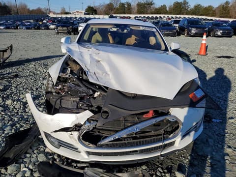 2015 Tesla Model S, VIN 5YJSA4H21FFP77395. Фото 5 из 6 с аукциона Copart. Каталог авто из США OpenDataCar.