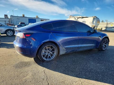 2021 Tesla Model 3, VIN 5YJ3E1EB0MF009979. Фото 3 з 6 з аукціону Copart. Каталог авто зі США OpenDataCar.