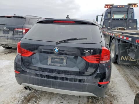 2015 Bmw X1, VIN WBAVL1C54FVY38468. Фото 6 из 6 с аукциона Copart. Каталог авто из США OpenDataCar.