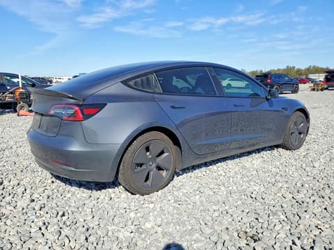 2023 Tesla Model 3, VIN 5YJ3E1EA1PF656497. Фото 3 з 6 з аукціону Copart. Каталог авто зі США OpenDataCar.
