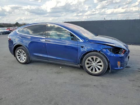 2017 Tesla Model X, VIN 5YJXCDE24HF053837. Фото 4 з 6 з аукціону Copart. Каталог авто зі США OpenDataCar.