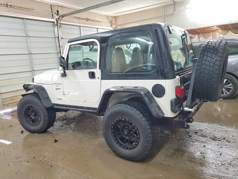 2002 Jeep Wrangler, VIN 1J4FA49S02P743202. Фото 2 з 6 з аукціону Copart. Каталог авто зі США OpenDataCar.