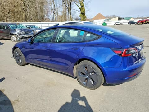 2023 Tesla Model 3, VIN 5YJ3E1EA0PF671153. Фото 2 з 6 з аукціону Copart. Каталог авто зі США OpenDataCar.