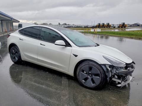 2023 Tesla Model 3, VIN 5YJ3E1EB8PF387570. Фото 4 з 6 з аукціону Copart. Каталог авто зі США OpenDataCar.
