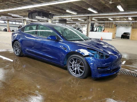 2022 Tesla Model 3, VIN 5YJ3E1EA8NF370711. Фото 4 з 6 з аукціону Copart. Каталог авто зі США OpenDataCar.