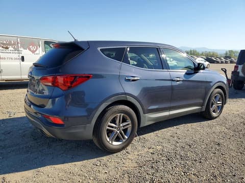 2018 Hyundai Santa Fe, VIN 5NMZTDLB9JH090379. Zdjęcie 3 z 6 z aukcji Copart. Katalog aut z USA OpenDataCar.