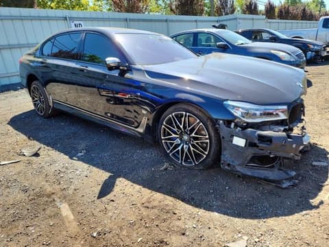 2017 Bmw M760i xDrive, VIN WBA7H6C31HG614426. Zdjęcie 4 z 6 z aukcji Copart. Katalog aut z USA OpenDataCar.
