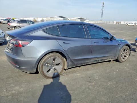 2023 Tesla Model 3, VIN 5YJ3E1EB9PF618704. Фото 3 з 6 з аукціону Copart. Каталог авто зі США OpenDataCar.