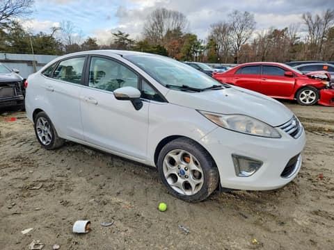 2011 Ford Fiesta, VIN 3FADP4CJ0BM221788. Фото 4 из 6 с аукциона Copart. Каталог авто из США OpenDataCar.