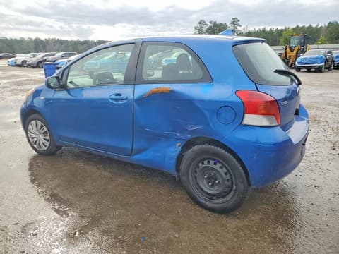 2009 Toyota Yaris, VIN JTDJT903195256769. Фото 2 з 6 з аукціону Copart. Каталог авто зі США OpenDataCar.