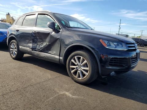 2014 Volkswagen Touareg, VIN WVGEF9BP7ED009437. Фото 4 из 6 с аукциона Copart. Каталог авто из США OpenDataCar.