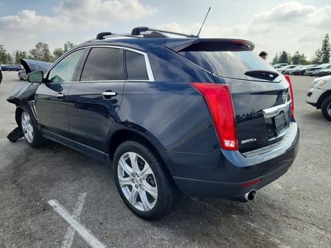 2016 Cadillac SRX, VIN 3GYFNDE30GS537907. Фото 2 з 6 з аукціону Copart. Каталог авто зі США OpenDataCar.