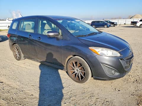 2015 Mazda 5, VIN JM1CW2CL6F0189114. Photo 4 of 6 from Copart auction. OpenDataCar US salvage catalog.