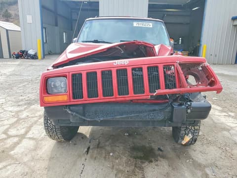 2000 Jeep Cherokee, VIN 1J4FF48S7YL264729. Photo 5 of 6 from Copart auction. OpenDataCar US salvage catalog.