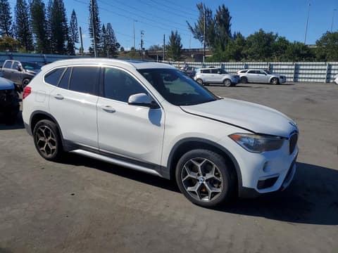 2018 Bmw X1, VIN WBXHU7C3XJ3F04390. Photo 4 of 6 from Copart auction. OpenDataCar US salvage catalog.