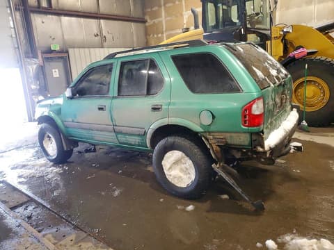 1999 Isuzu Rodeo, VIN 4S2CM58W9X4319380. Photo 2 of 6 from Copart auction. OpenDataCar US salvage catalog.