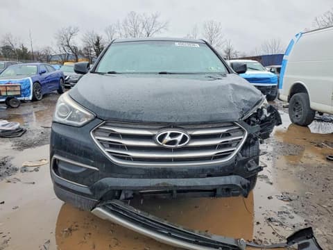 2017 Hyundai Santa Fe, VIN 5XYZT3LB4HG379958. Zdjęcie 5 z 6 z aukcji Copart. Katalog aut z USA OpenDataCar.