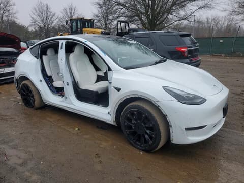 2023 Tesla Model Y, VIN 7SAYGDEE0PA196415. Photo 4 of 6 from Copart auction. OpenDataCar US salvage catalog.