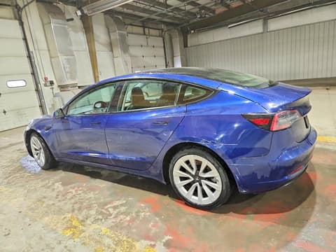 2023 Tesla Model 3, VIN 5YJ3E1EA8PF451999. Фото 2 з 6 з аукціону Copart. Каталог авто зі США OpenDataCar.