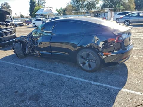 2023 Tesla Model 3, VIN 5YJ3E1EAXPF662900. Фото 2 з 6 з аукціону Copart. Каталог авто зі США OpenDataCar.