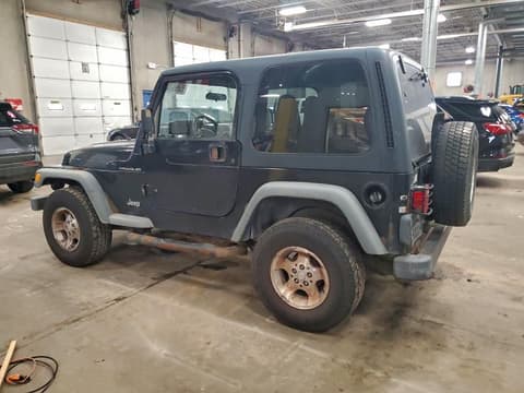 2002 Jeep Wrangler, VIN 1J4FA49S42P744904. Фото 2 з 6 з аукціону Copart. Каталог авто зі США OpenDataCar.