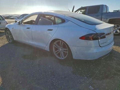 2014 Tesla Model S, VIN 5YJSA1H11EFP57345. Фото 2 из 6 с аукциона Copart. Каталог авто из США OpenDataCar.