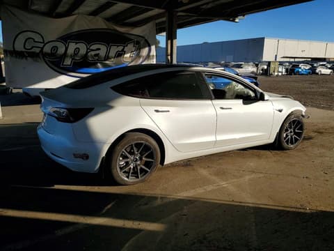 2023 Tesla Model 3, VIN 5YJ3E1EA9PF621402. Zdjęcie 3 z 6 z aukcji Copart. Katalog aut z USA OpenDataCar.