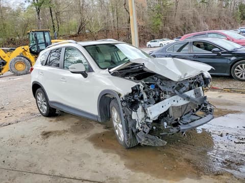 2015 Mazda CX-5, VIN JM3KE2DY0F0476013. Zdjęcie 4 z 6 z aukcji Copart. Katalog aut z USA OpenDataCar.