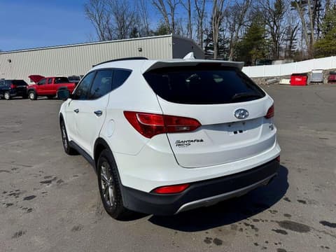 2014 Hyundai Santa Fe, VIN 5XYZUDLBXEG195655. Фото 2 з 6 з аукціону Copart. Каталог авто зі США OpenDataCar.