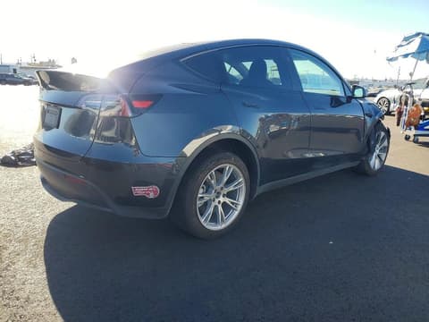 2024 Tesla Model Y, VIN 7SAYGDEE9RF009713. Фото 3 з 6 з аукціону Copart. Каталог авто зі США OpenDataCar.