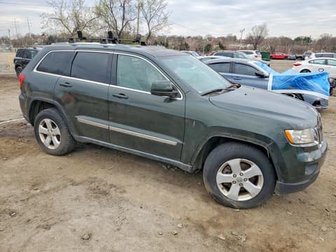 2011 Jeep Grand Cherokee, VIN 1J4RR4GT3BC590825. Photo 4 of 6 from Copart auction. OpenDataCar US salvage catalog.