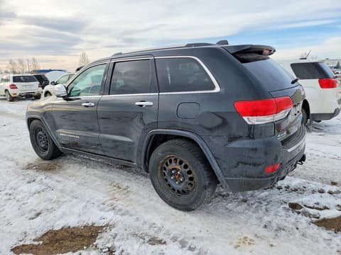 2014 Jeep Grand Cherokee, VIN 1C4RJFCM4EC318893. Фото 2 з 6 з аукціону Copart. Каталог авто зі США OpenDataCar.