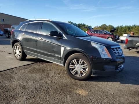 2014 Cadillac SRX, VIN 3GYFNBE37ES687854. Photo 4 of 6 from Copart auction. OpenDataCar US salvage catalog.