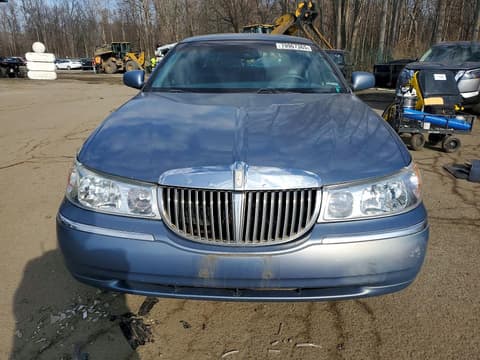 1999 Lincoln Town Car, VIN 1LNHM81WXXY658411. Photo 5 of 6 from Copart auction. OpenDataCar US salvage catalog.