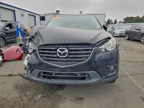 2016 Mazda CX-5, VIN JM3KE4CY4G0617759. Фото 5 з 6 з аукціону Copart. Каталог авто зі США OpenDataCar.