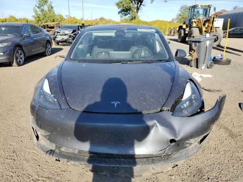2023 Tesla Model 3, VIN LRW3E1FA9PC920932. Фото 5 з 6 з аукціону Copart. Каталог авто зі США OpenDataCar.