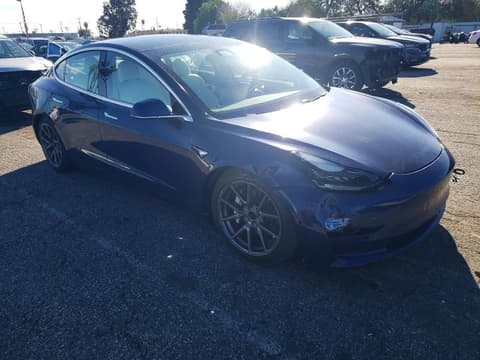 2020 Tesla Model 3, VIN 5YJ3E1EA3LF797713. Фото 4 з 6 з аукціону Copart. Каталог авто зі США OpenDataCar.