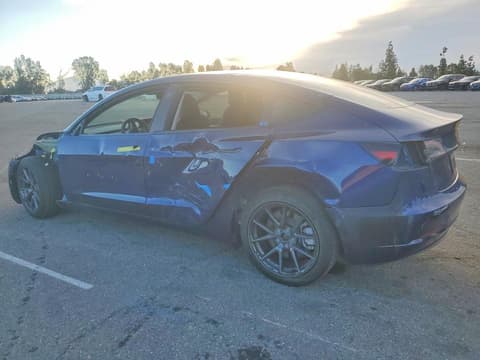 2023 Tesla Model 3, VIN 5YJ3E1EB8PF594556. Фото 2 з 6 з аукціону Copart. Каталог авто зі США OpenDataCar.